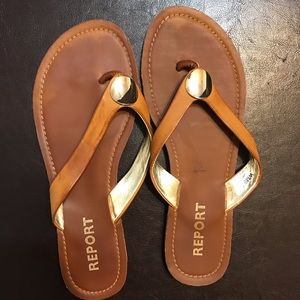 Tan leather flip flops